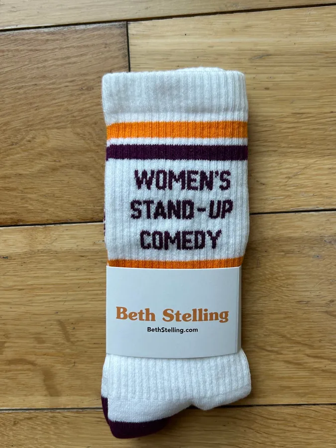 Women’s Stand-up Comedy crew socks in white with tangerine and purple stripes